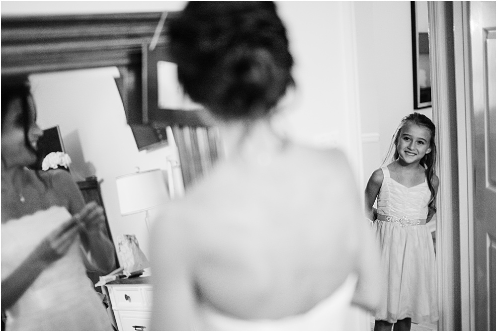 We sometimes plan this “moment” but didn’t need to this time. The sweet flower girl peeked in on the Bride (also her soon to be step-mom) and was just delighted! How precious is this?