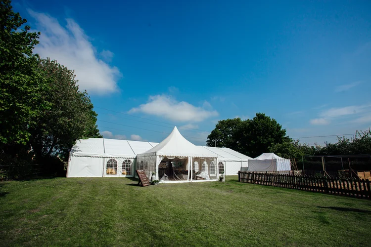Carys and Nick's wedding at Berkswell Church and a family marquee — photo 2 of 92