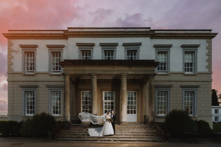 Beth and Alex's wedding at Buxted Park, East Sussex — photo 1 of 140