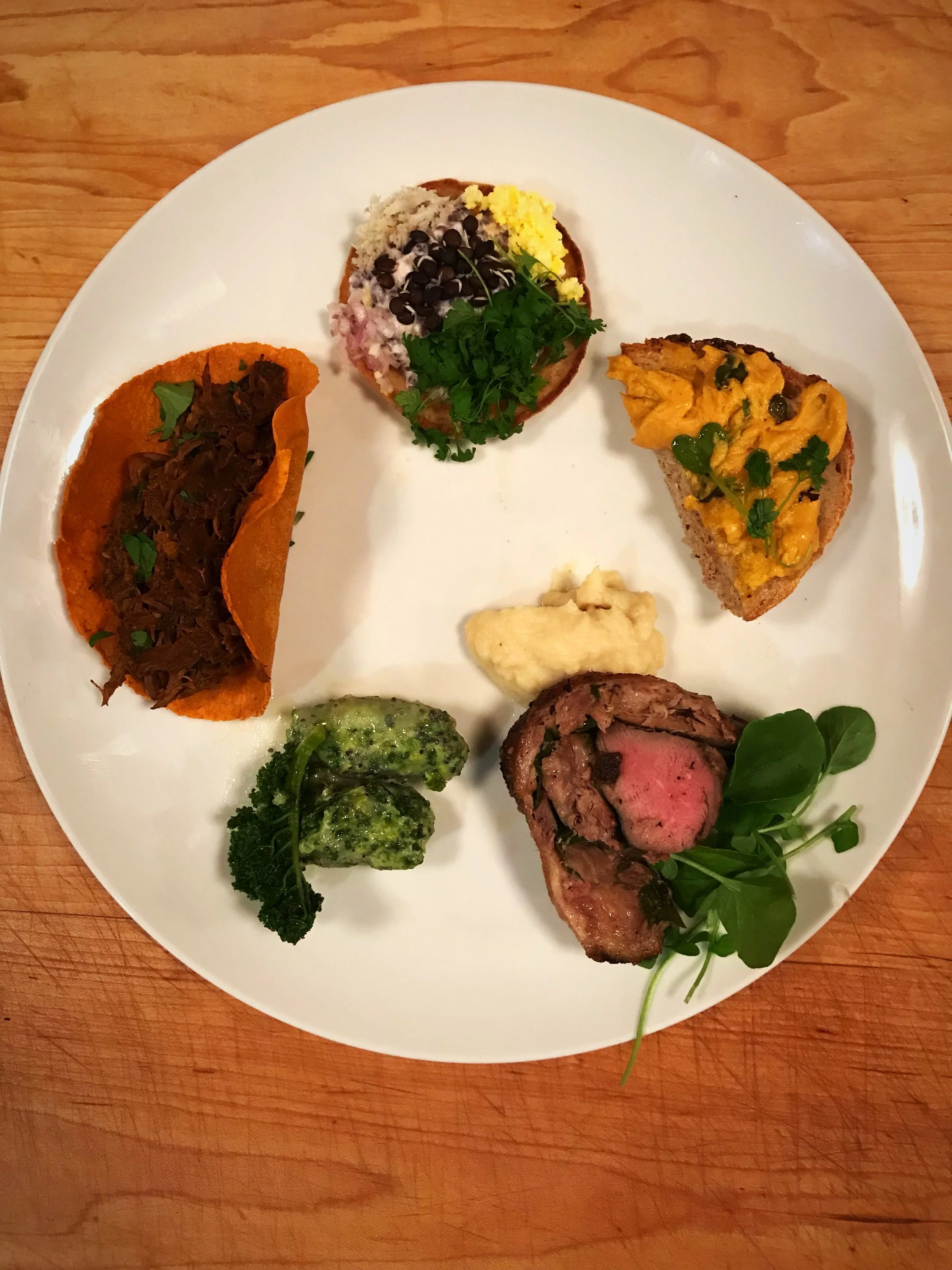 Each of the First Five Course from the January Farm to Table Dinner: Carrot Butter on Sourdough; Rye Blini with Sprouted Lentils; Venison Barbacoa; Kale Malfatti; and Duck Roulade