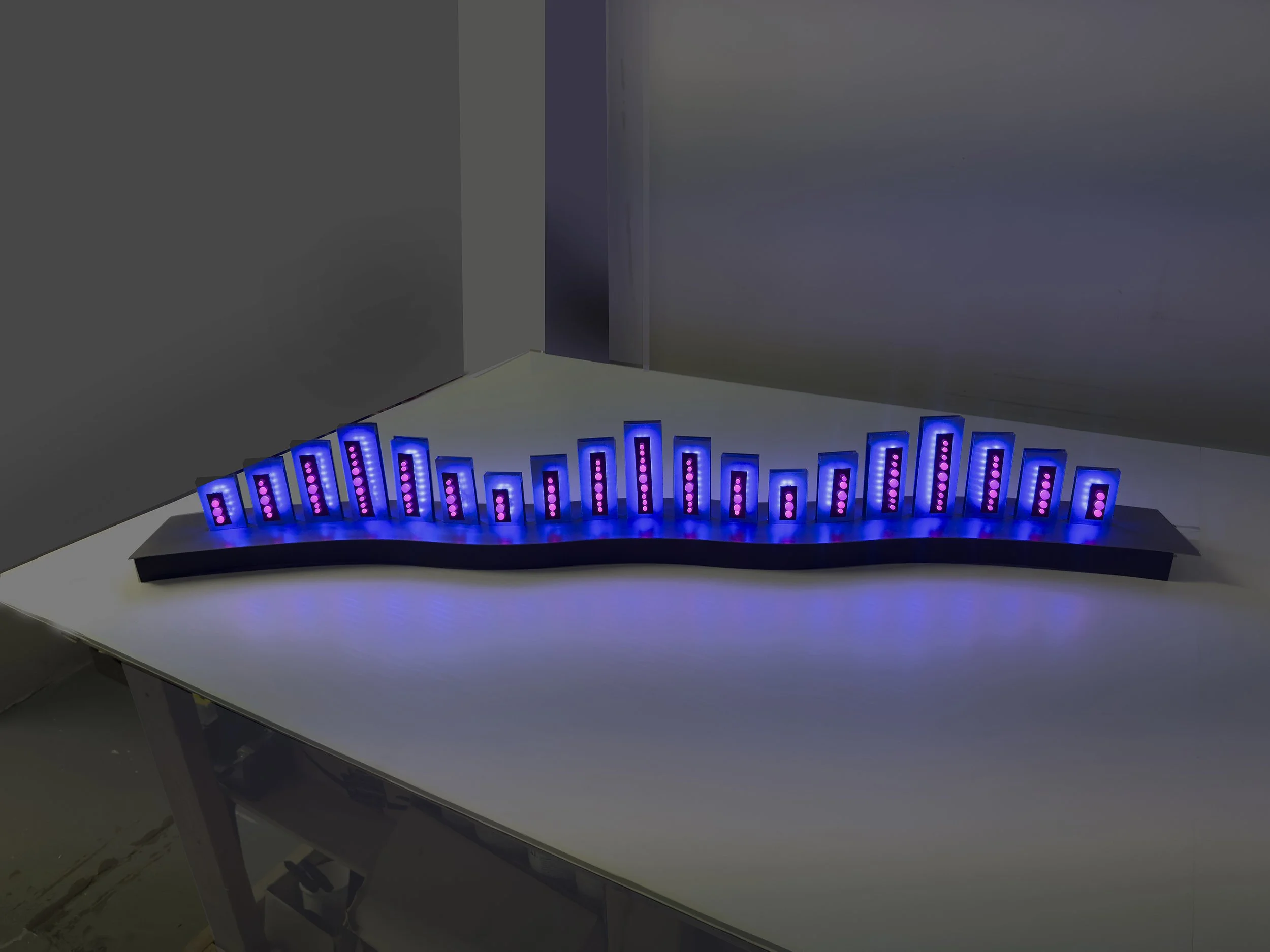 Carol Salmanson_The Wave_LEDs, aluminum, wood base_7.25Hx48Wx4.25D_2025.jpg