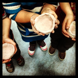 Freshly glazed pinch pots created by kindergardeners!