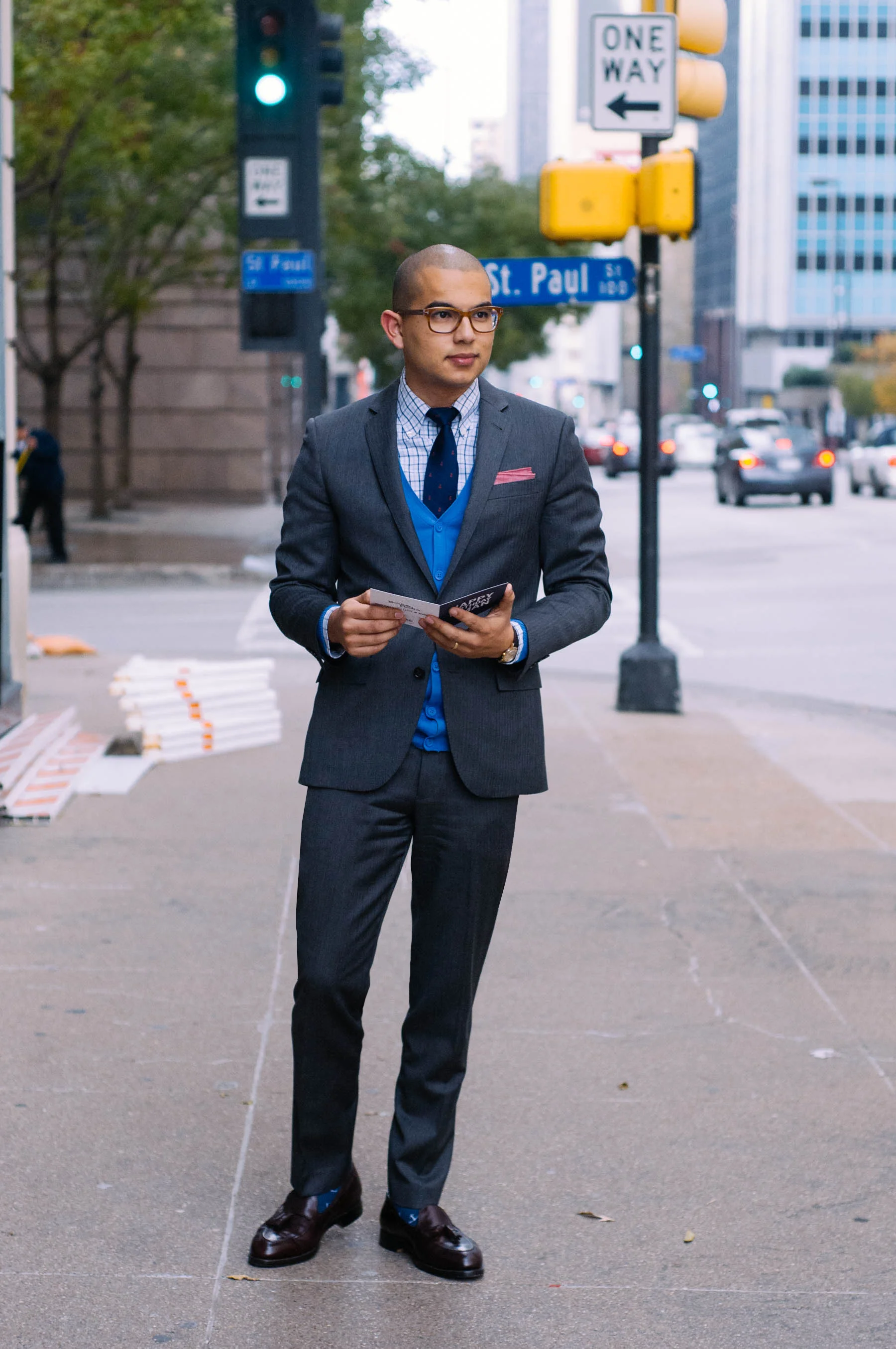 Suit: J.Crew | Shirt: Brooks Brothers | Sweater: H&M | Shoes: Alden | Socks: J.Crew | Tie: J.Crew | Pocket Square: The Tie Bar | Watch: Omega | Glasses: Tom Ford