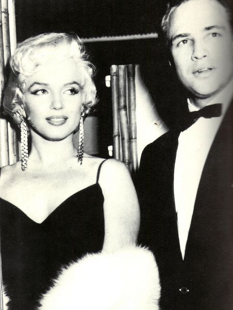 At the Oscars with Marilyn (before he went nuts and refused to go to the Oscars anymore)... I wonder if they ever hooked up...