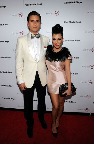 I will always love a cream, shawl collar tux jacket. But WTF is Kourtney wearing?
