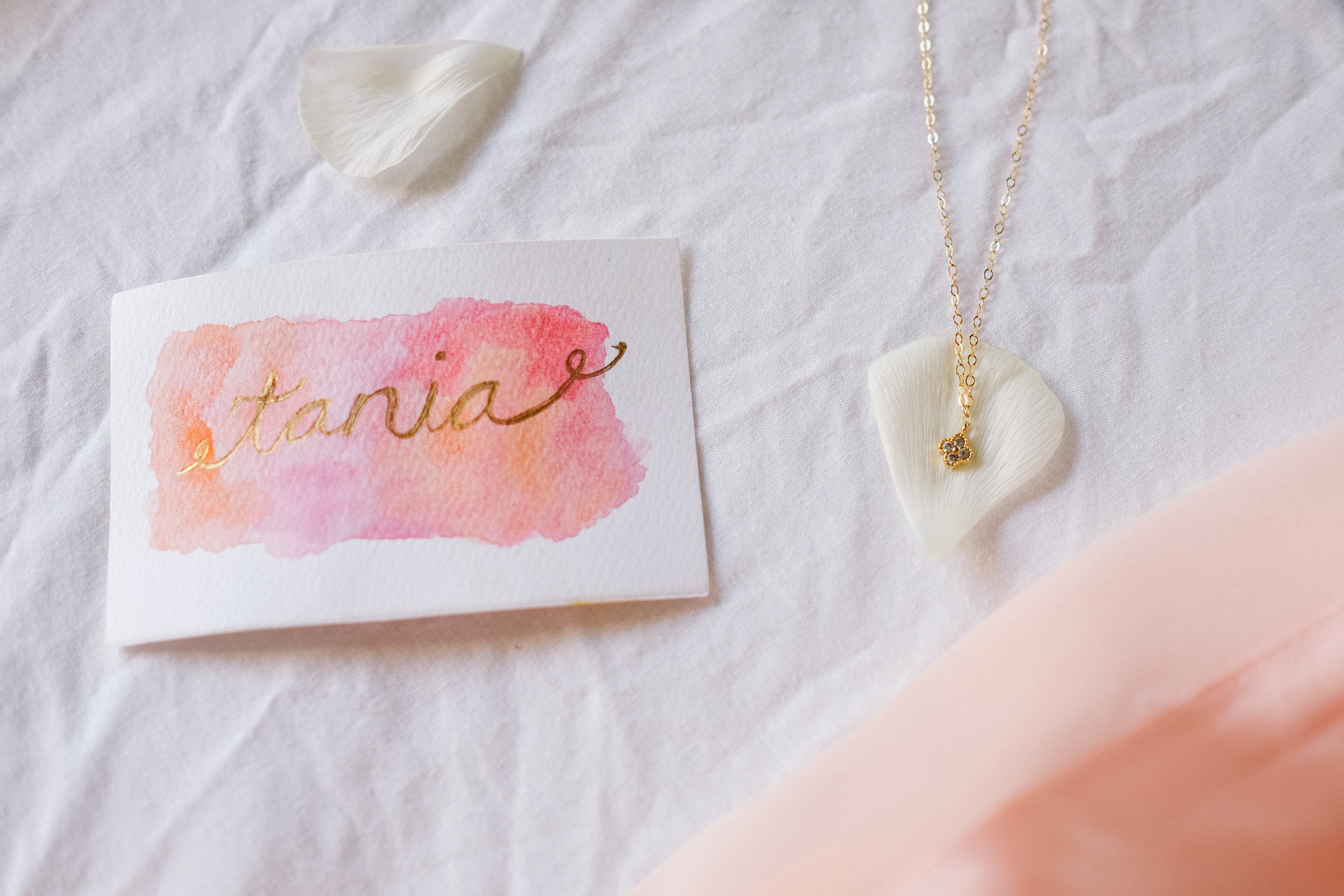 name cards and necklace