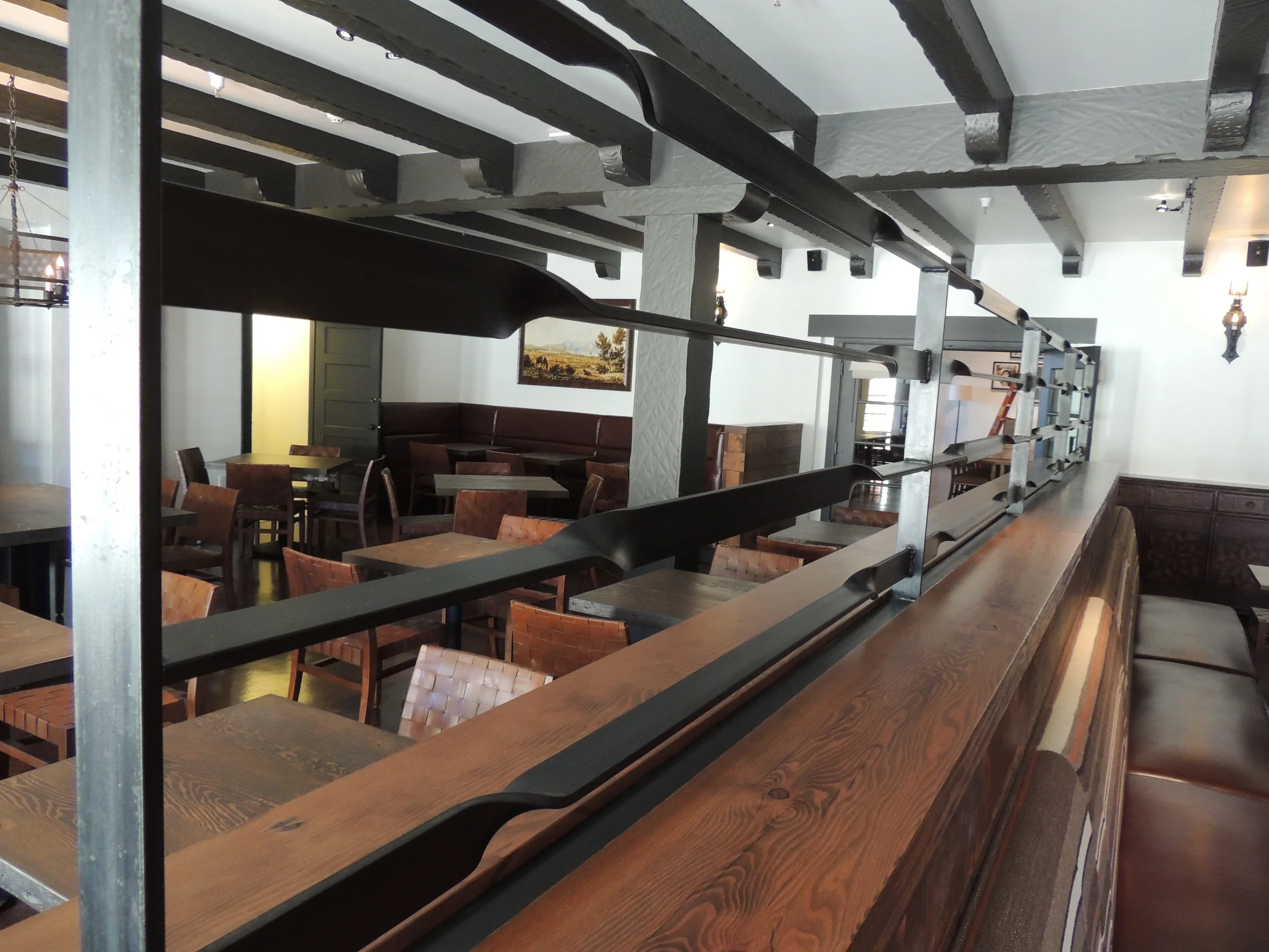 Custom metalwork installed by Fineline at San Francisco’s Arguello Restaurant.