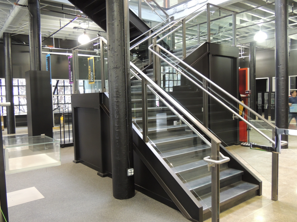 With its clean lines, the grand staircase at the Van Ness MINI dealership truly makes the space.