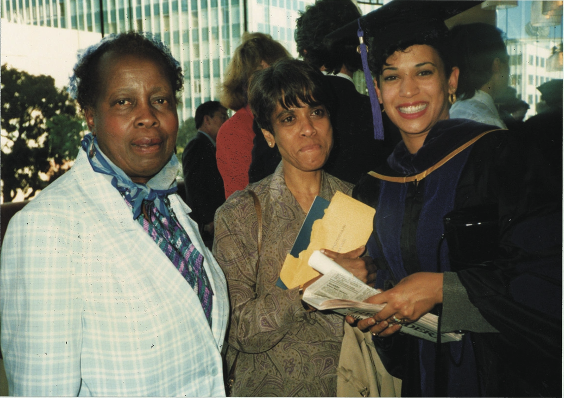 Harris graduates from law school in 1989. "My first grade teacher, Mrs. Wilson (left), came to cheer me on," Harris said. "My mom was pretty proud, too."