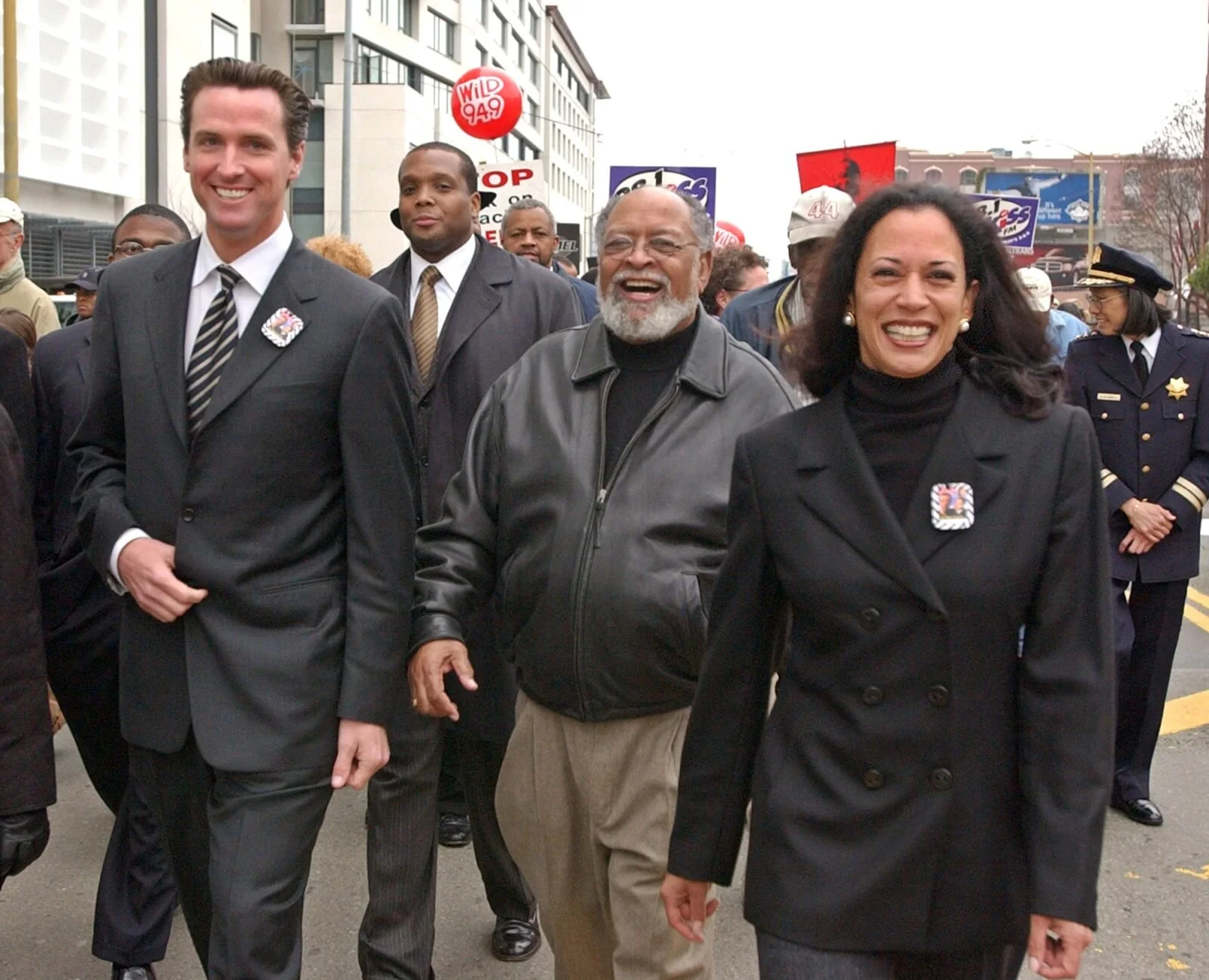 Harris is joined by San Francisco Mayor Gavin Newsom, left, and the Rev. Cecil Williams, center, for a San Francisco march celebrating Martin Luther King Jr. in January 2004. Harris was the city's district attorney from 2004 to 2011.   By Paul Sakuma