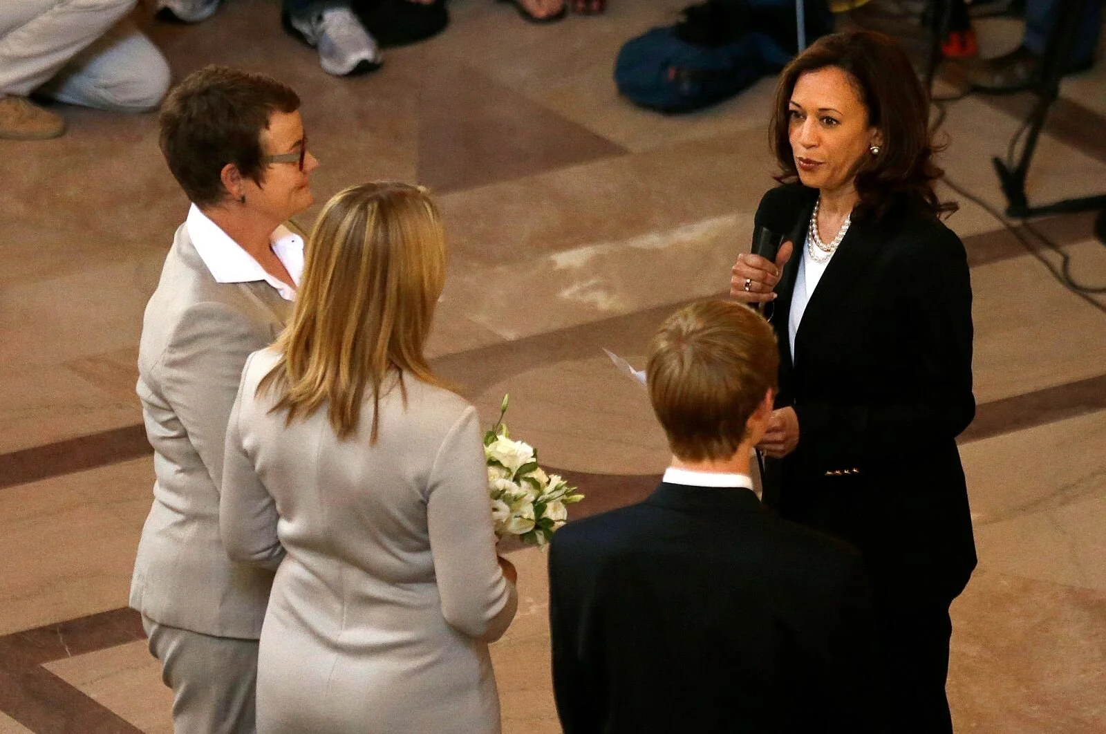 Harris officiates the wedding of Kris Perry, left, and Sandy Stier in June 2013. Perry and Stier were married after a federal appeals court cleared the way for California to immediately resume issuing marriage licenses to same-sex couples.  by Jeff Chiu