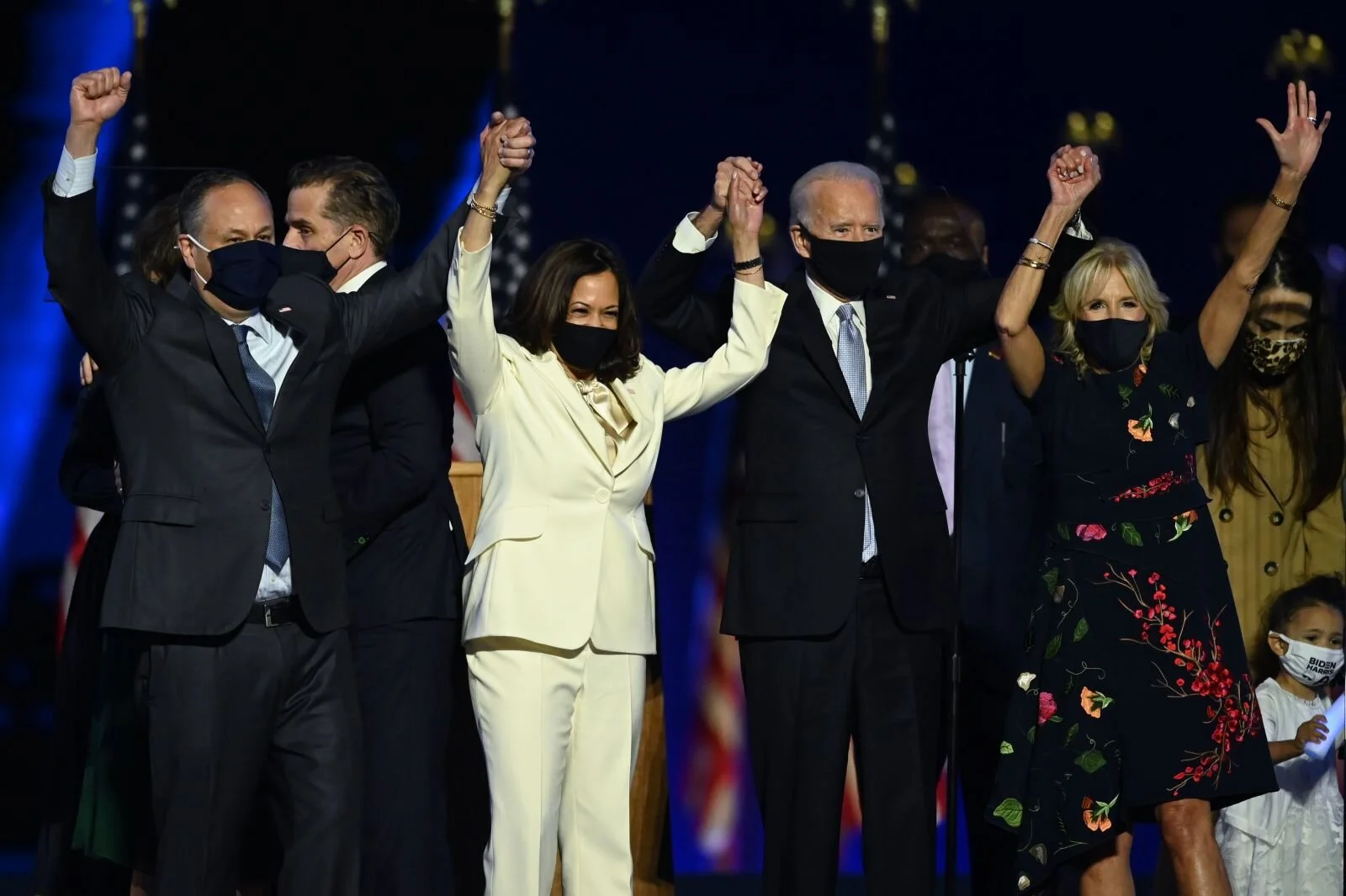 Harris and Biden are joined by their spouses after their victory speeches in Wilmington, Delaware, in November 2020.  Jim Watson
