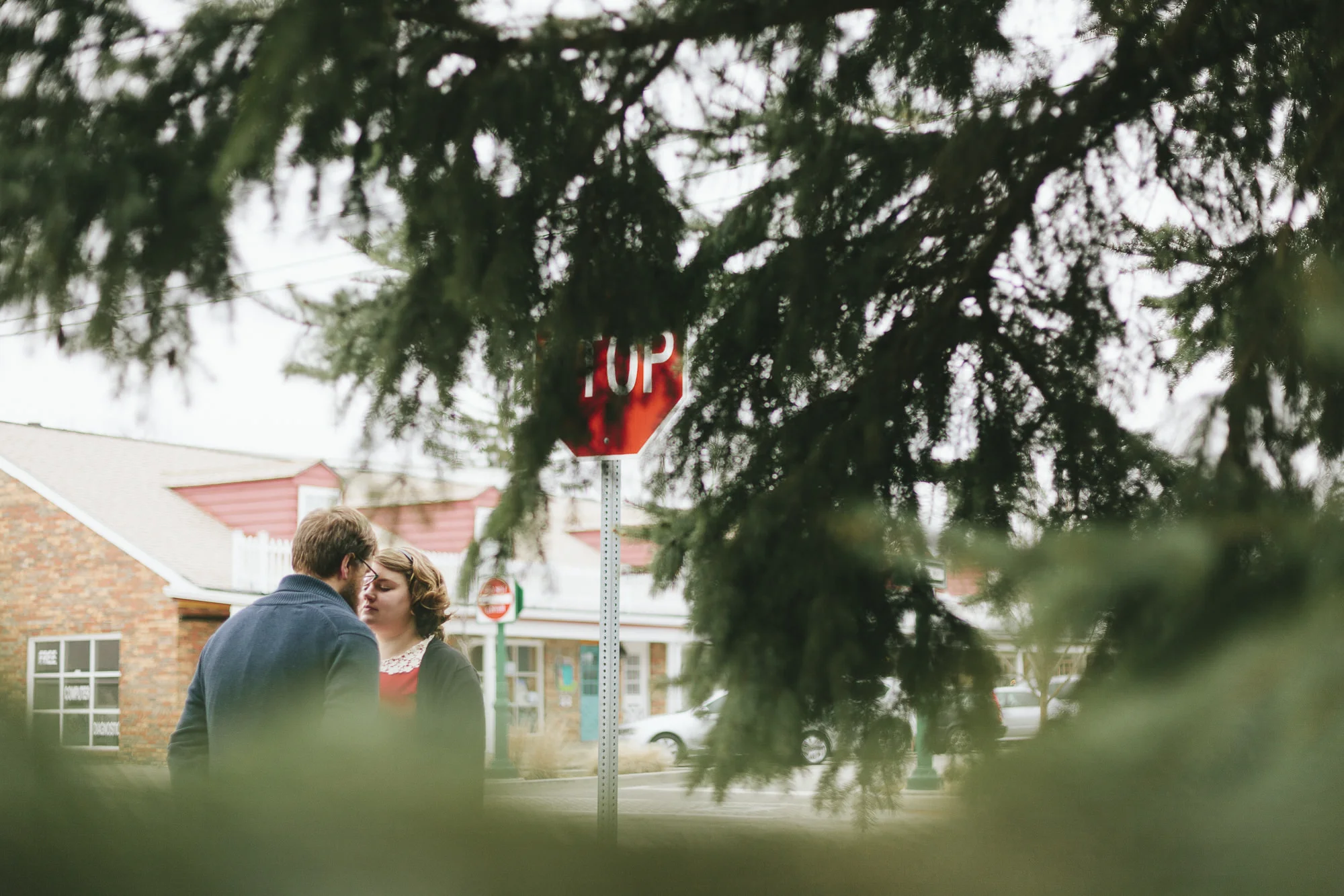 Retro couple kissing in trees