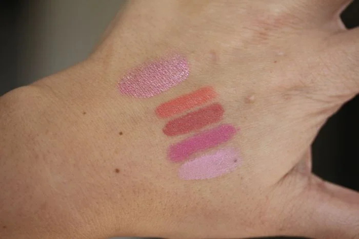 Swatches from top to bottom: NARS Illuminator in Adelaide and Satin Lip Pencils in Torres del Paine, Descanso, Villa Lante & Stourhead