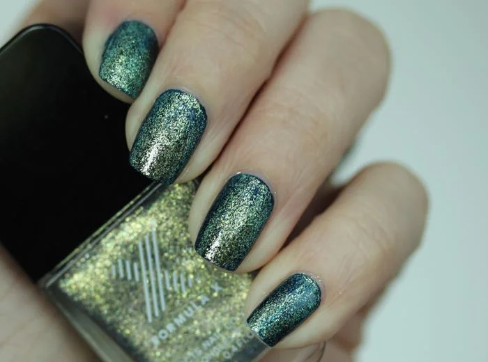 I went three weeks without having to trim my cuticles (wearing Sephora's Devious over Essie's Midnight Cami)