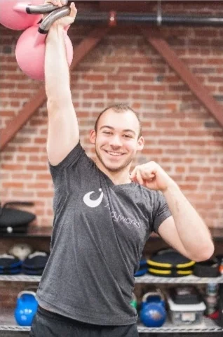 Practicing Kettlebell sport inside of J Bodyworks 