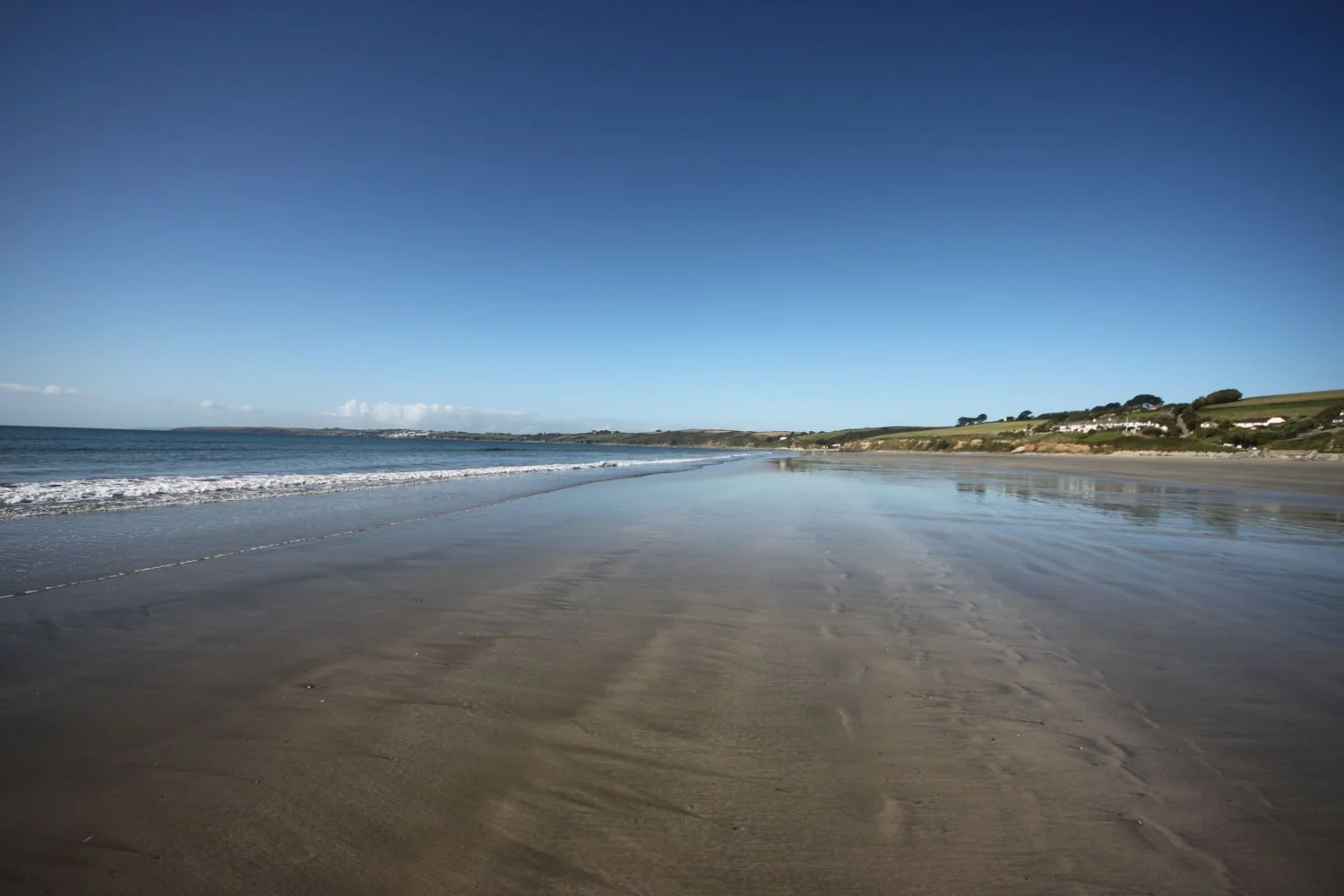 walking across pendower beach