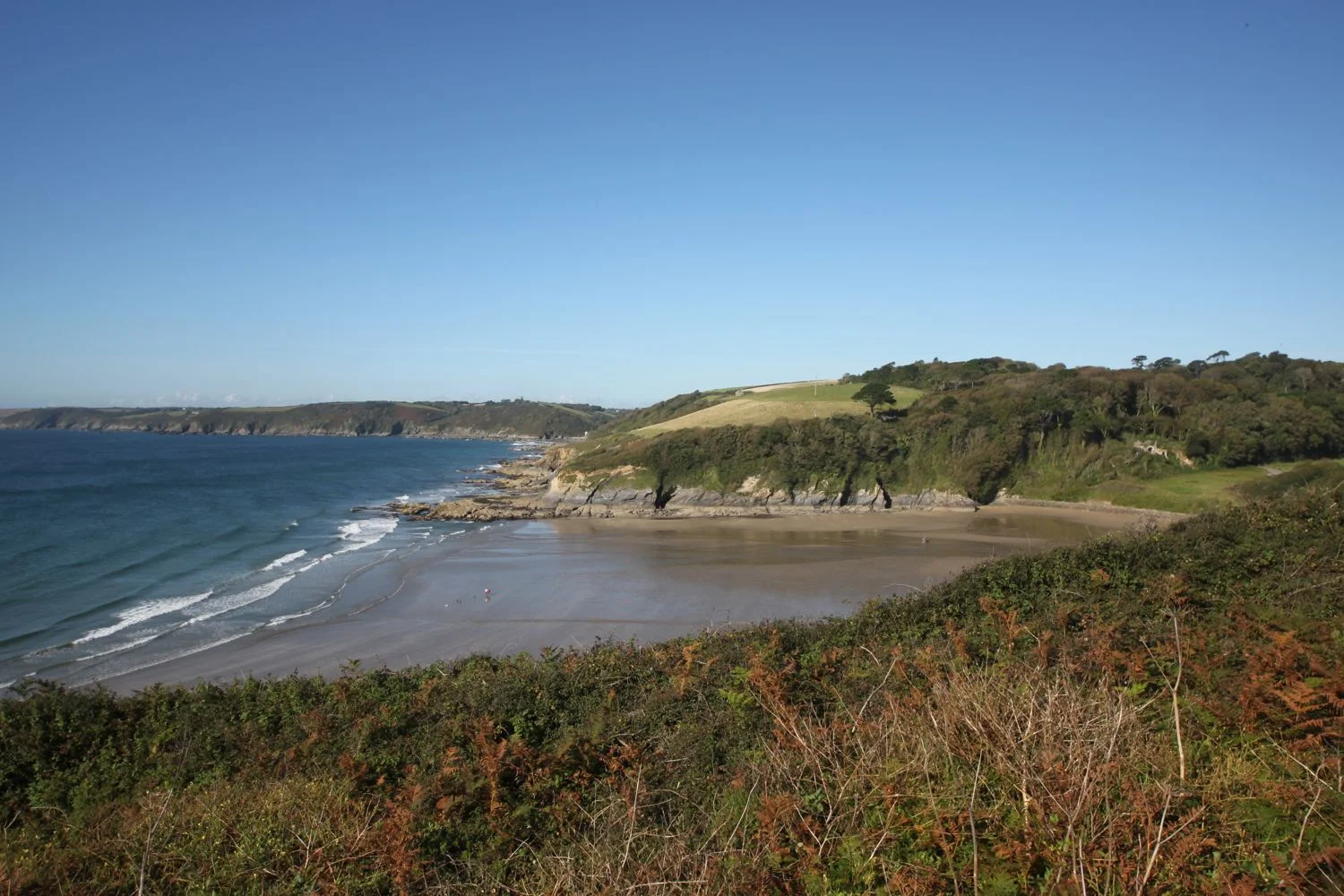 view back over porthluny cove