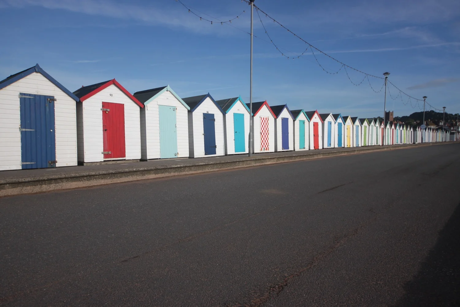 colourful beach huts on preston sands