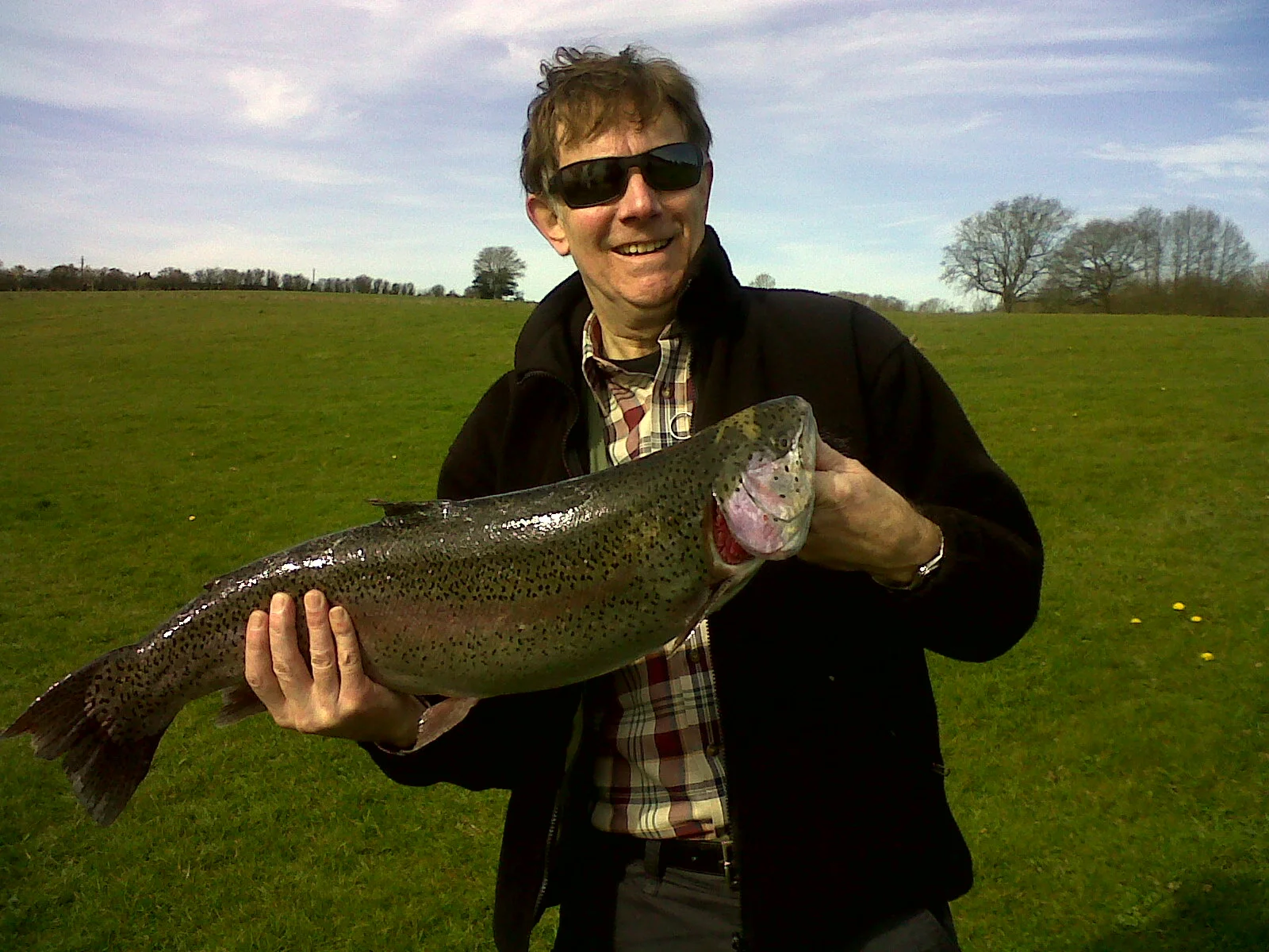 Mr Ian Powers of Lewes catches a 10lb 6.5oz rainbow on a Green & White Sparkly Cats Whisker using a floating line with a 4m leader 