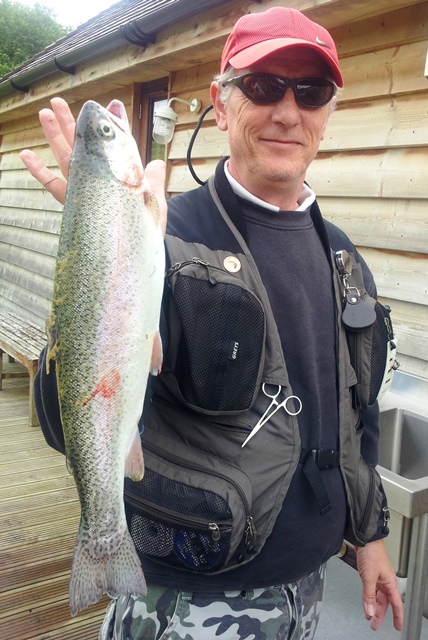 Keith Verral bags a 3lb 4oz rainbow from the new Stag Lake