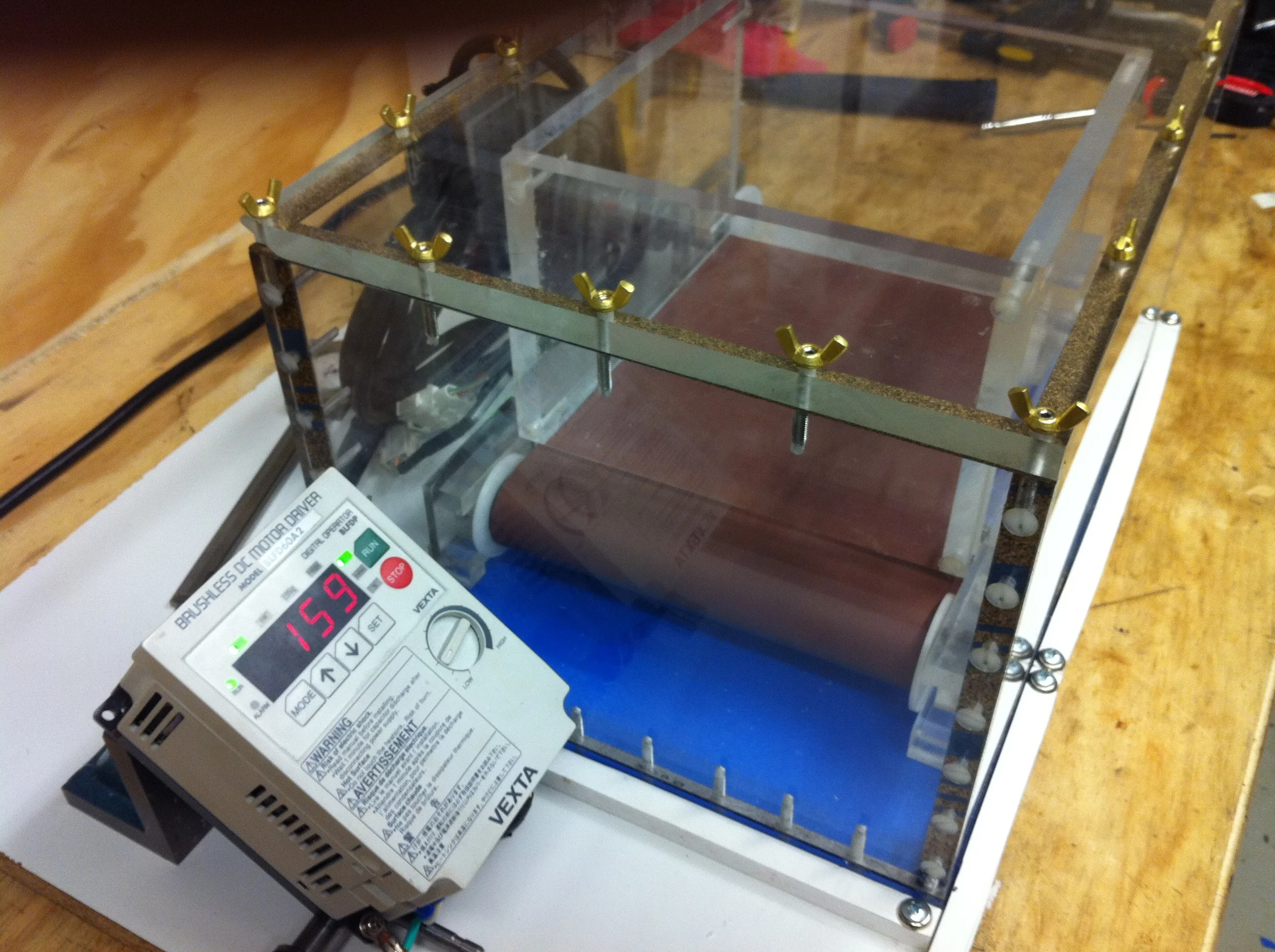  The digital motor controller was programmed to determine the belt's acceleration and speed.&nbsp; 