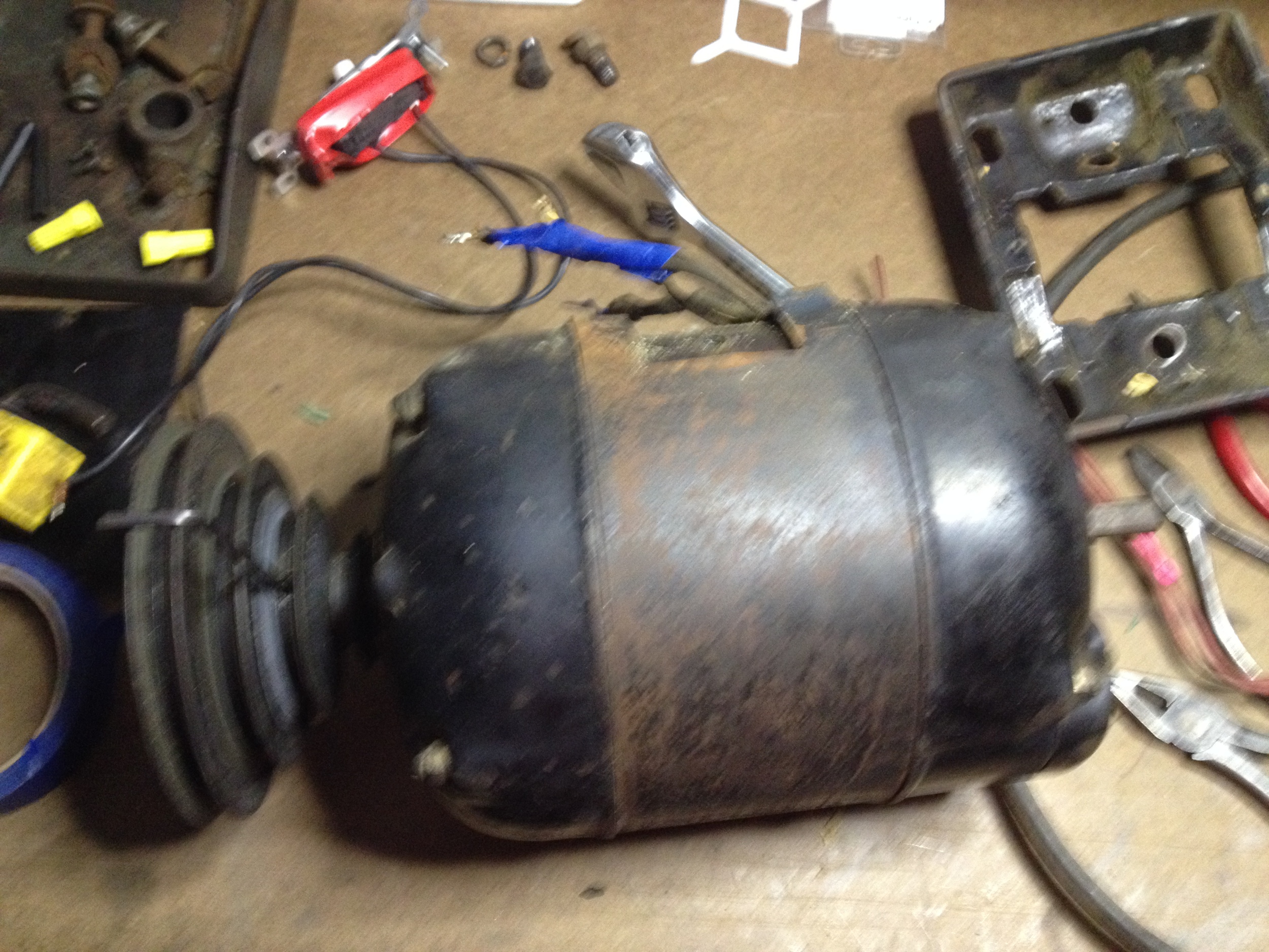  Craftsman motor with broken switch, rust, and more of that black paint. &nbsp;Pretty sure this is a replacement. &nbsp; 