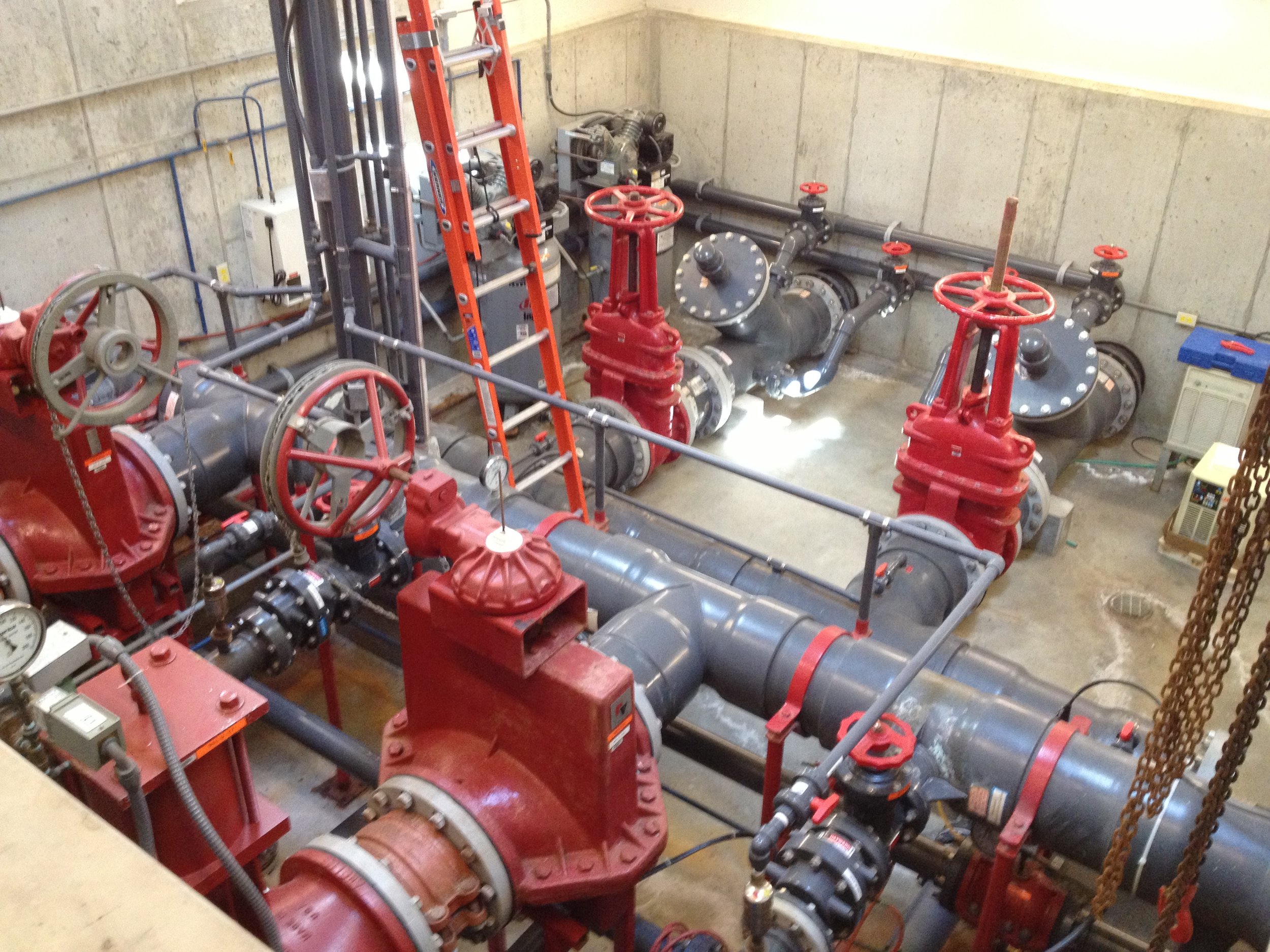 INSIDE THE PUMPHOUSE: Twin 16 inch intake lines feed three 50hp pumps that supply water at 2000 gallons per minute!