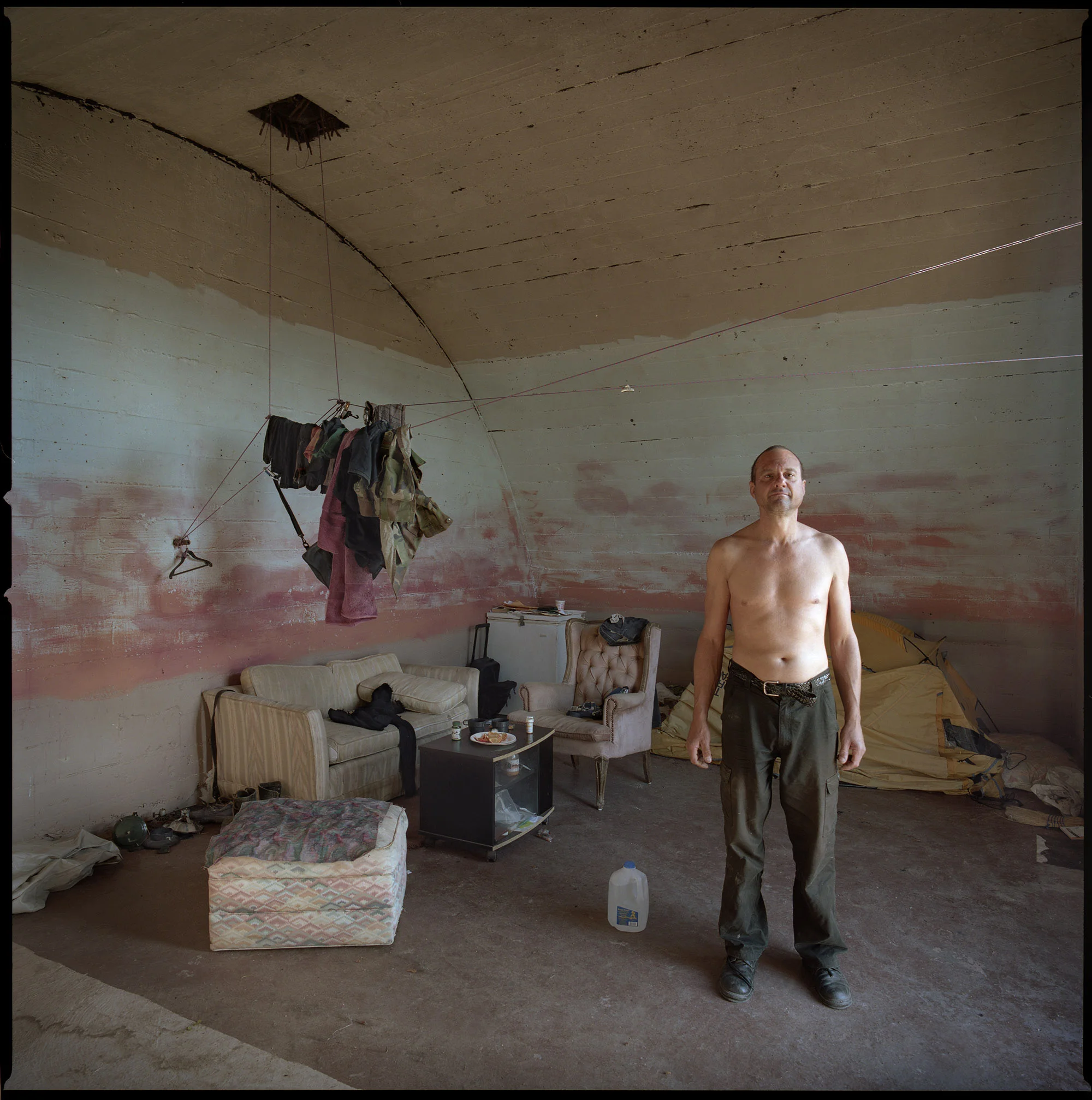 07. Scott Meyer in his bunker. Slab City. March 1, 2011.jpg