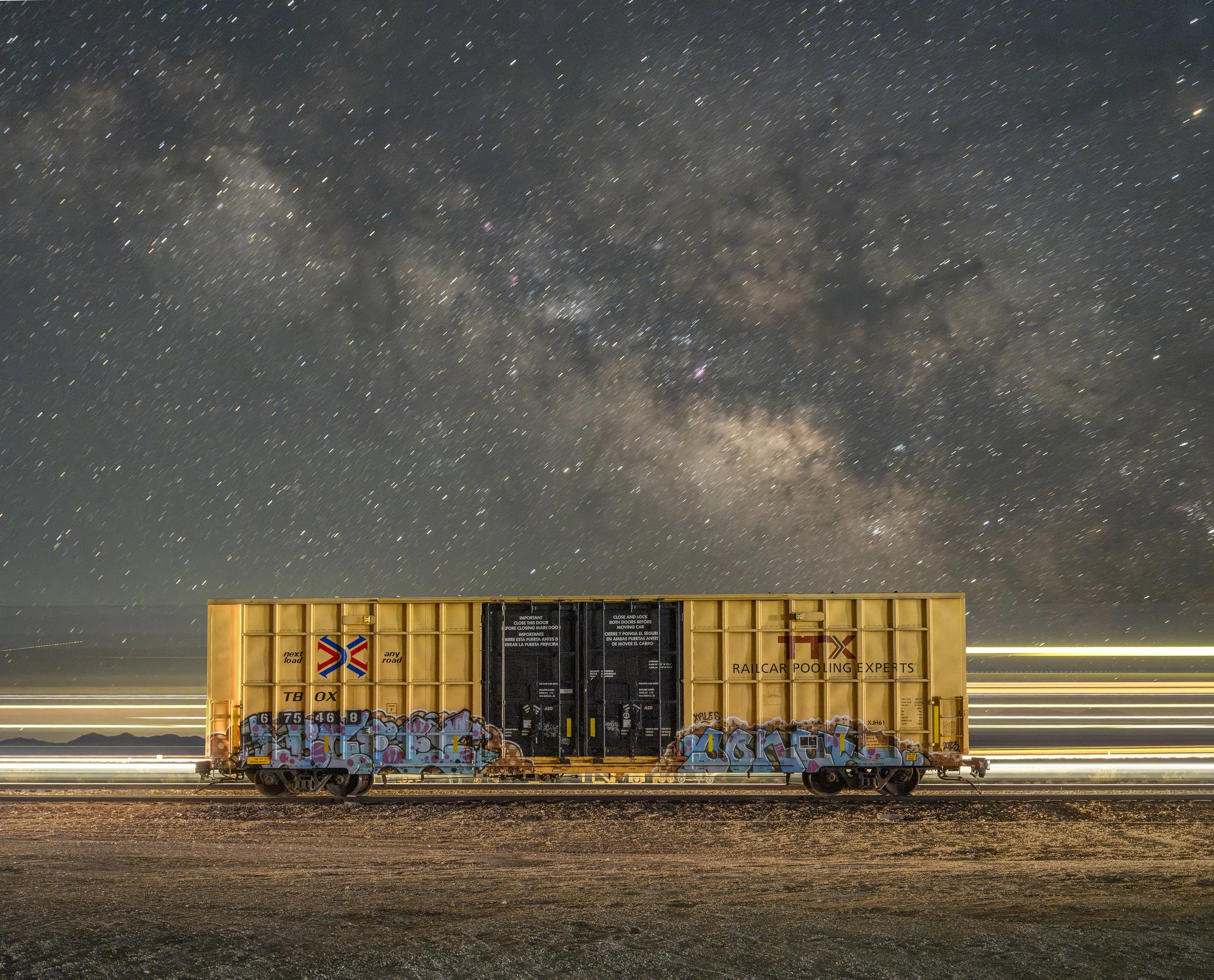Boxcar with Passing Train. Fenner, California. June 10, 2026