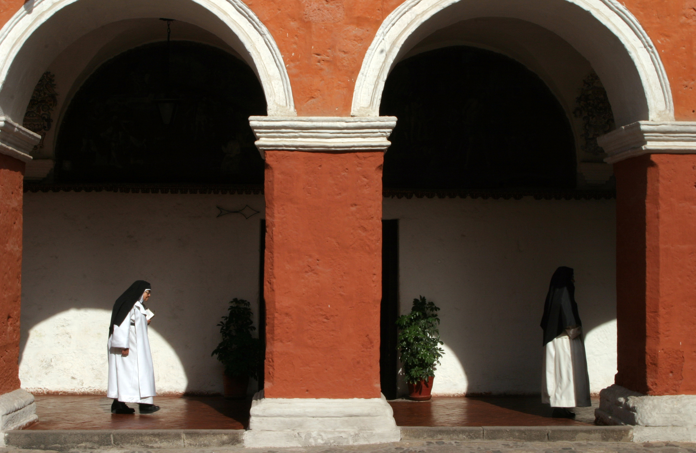  Sister Consuelo de Jesus walks back to the private part of the monastery after morning Mass. 