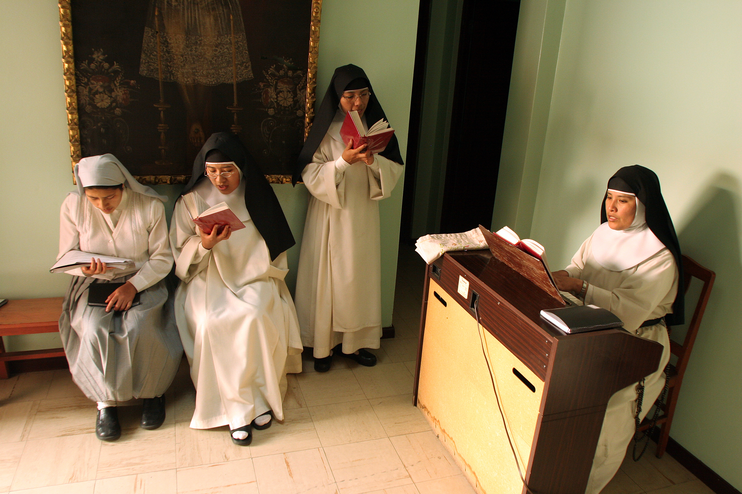  The sisters conduct choir practice. 