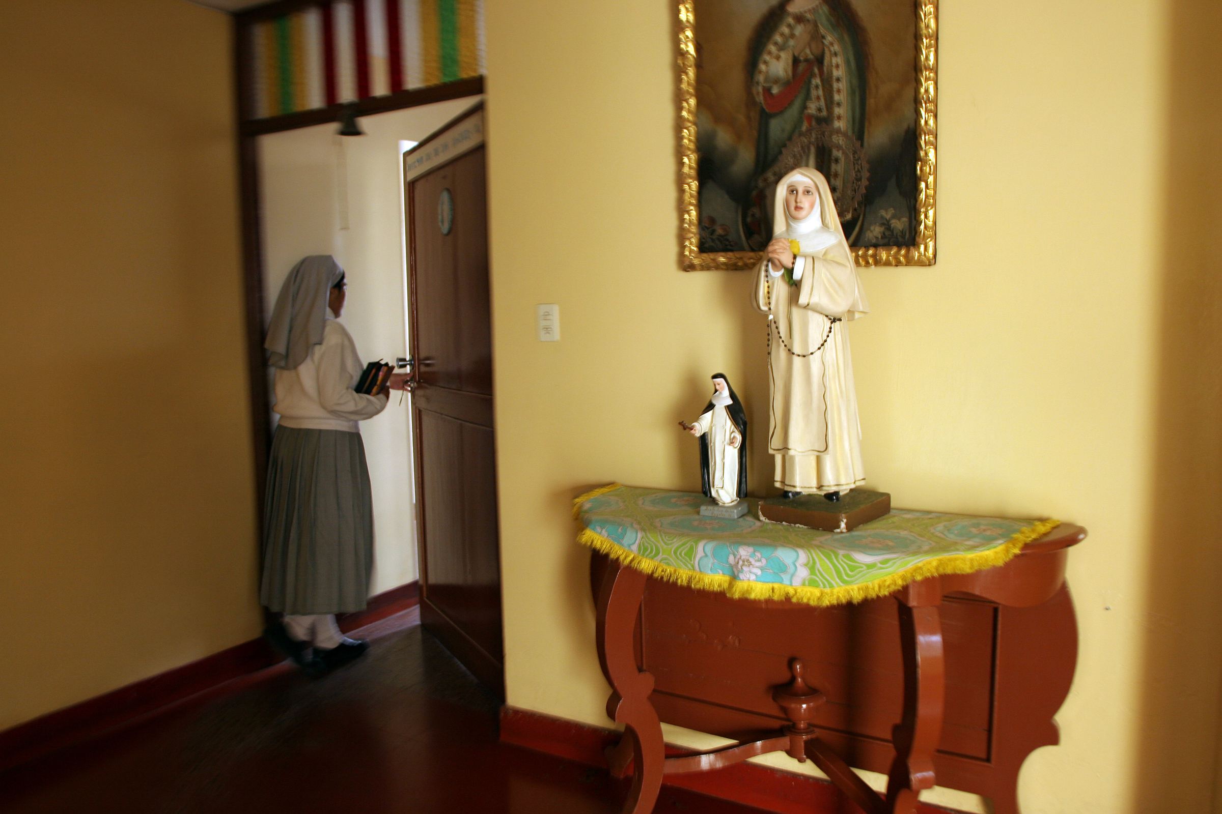  Sister Heidi walks to the dormitory area. 