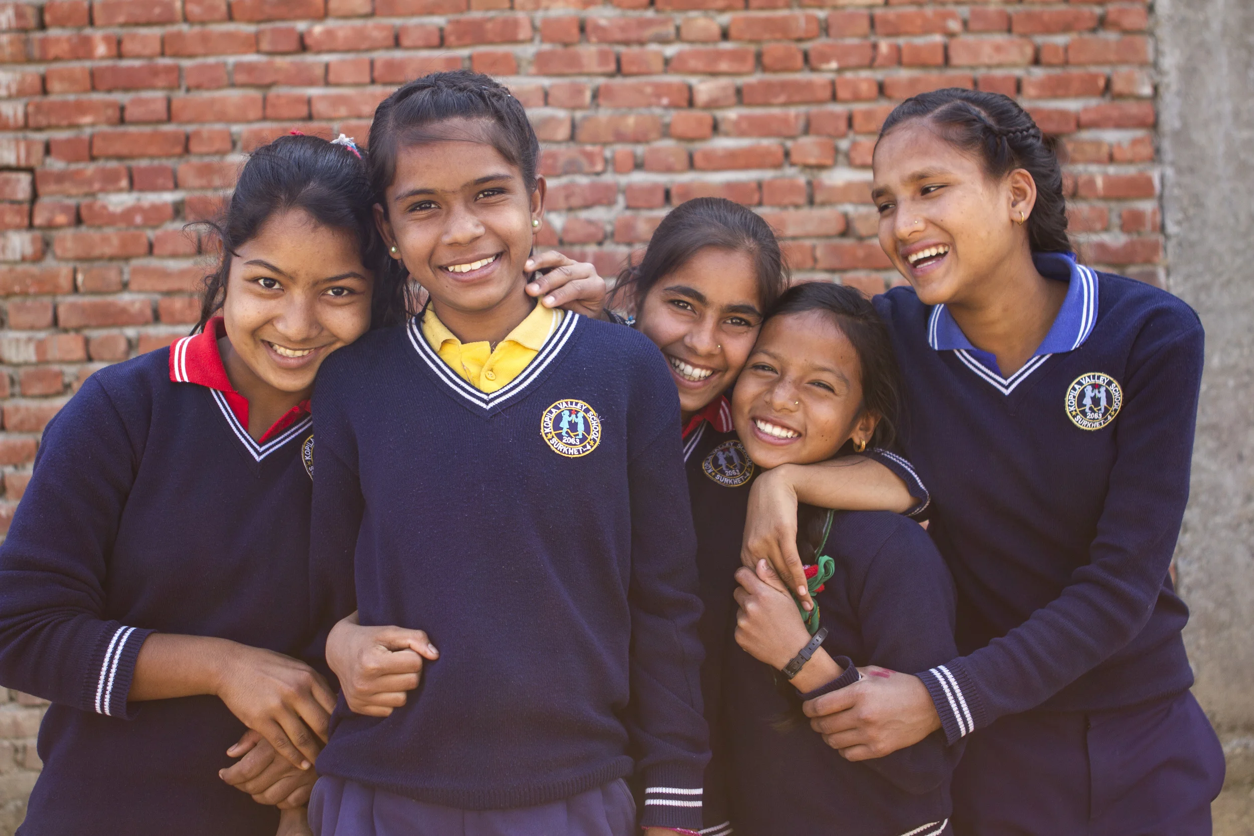  Deepa, Durga, Sarita, Jharana, and Sunita pose. 