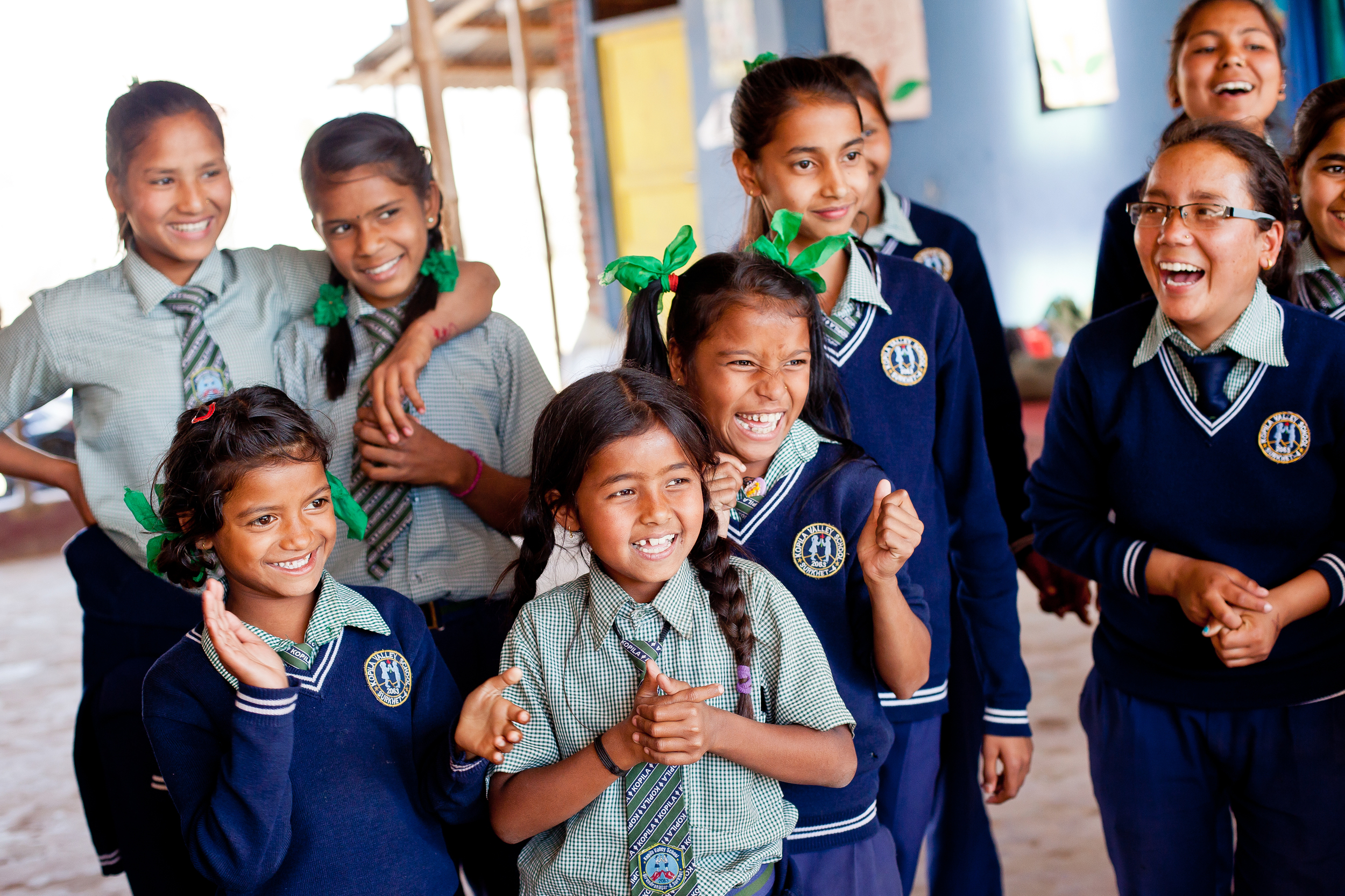  She's the First Scholars in Nepal play a team building game, March 2015. 

Back row: Sunita S., Durga S., Apeksha K., Roshni S. Front row: Purnima P., Aliza T.M., Chandani B. (photo by Kate Lord) 