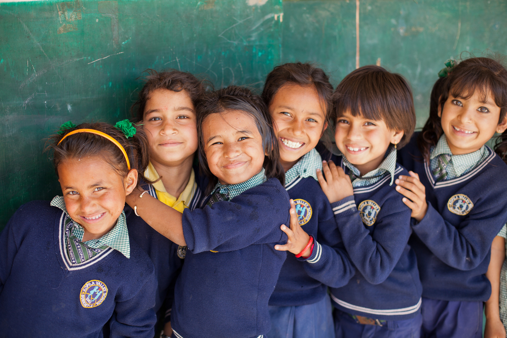  Second graders line up outside their classroom in Nepal, March 2015, including She's the First Scholars (starting third from right), Anisha B, Ganga S., and Tika G. (photo by Kate Lord) 