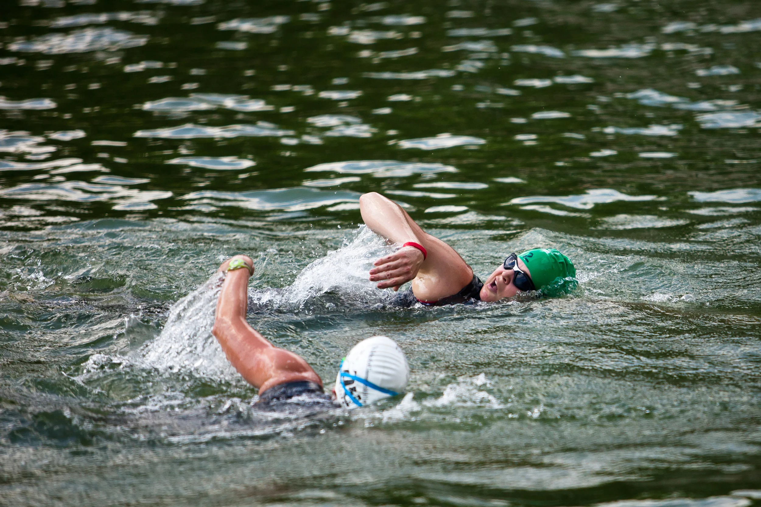  Amy Dixon (back, in green cap), a visually impaired sommelier and triathlete, competes in the swim portion of the 2014 Dallas Panamerican Triathlon Confederation (PATCO) Triathlon Pan American Championships on June 1, 2014 at the Marriott Las Colina