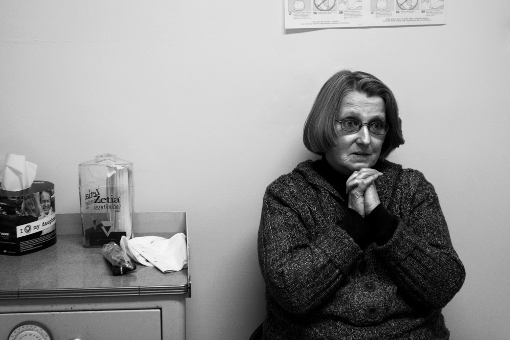 Barbara listens to Dr. Stover on her last visit to the clinic. She has qualified for Medicaid and will no longer need the clinic’s services.