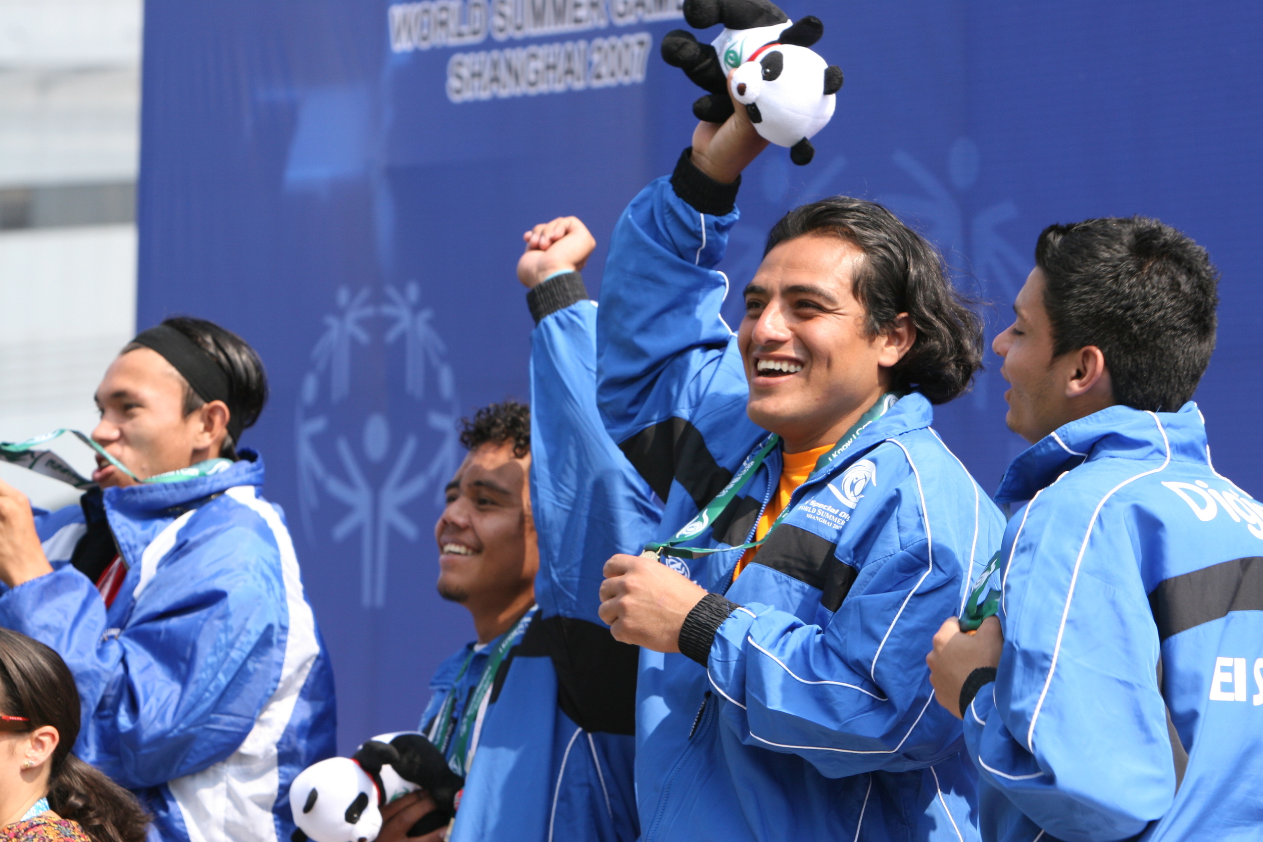 Gustavo Deras, 27, celebrates El Salvador’s gold medal in men’s 11-a-side football at the award ceremony at Shanghai Songjiang Stadium.