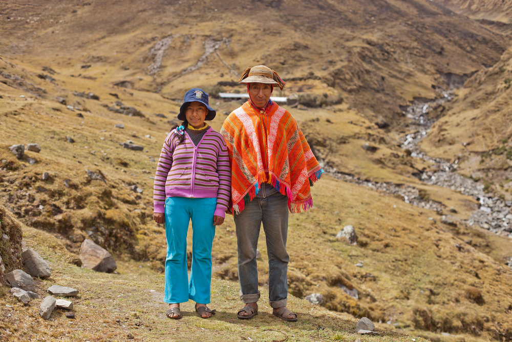  Vicentina and her father pose near their home in the Andes. 