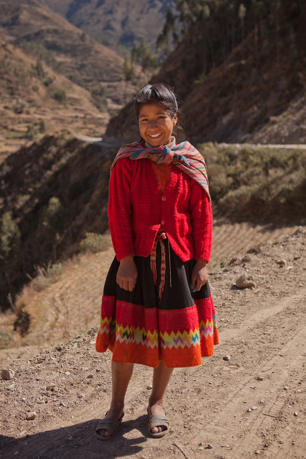  We ran into Elizabeth on her way back home from helping her mom at the market. Elizabeth lives in a rural mountain community, and she lives at the dorm during the week to make her commute to school possible. 