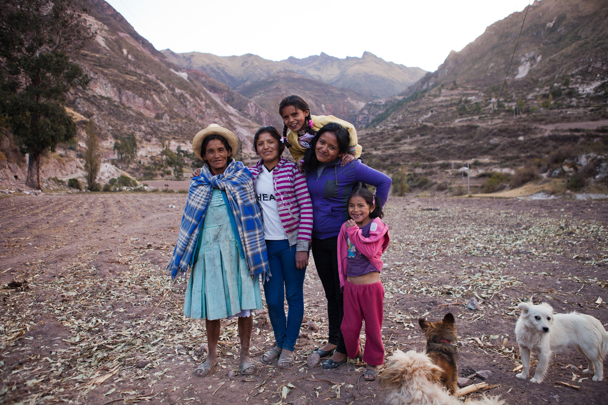  She's the First Scholar Nohemi (second from left) poses with her mother and sisters near their home in Peru. 