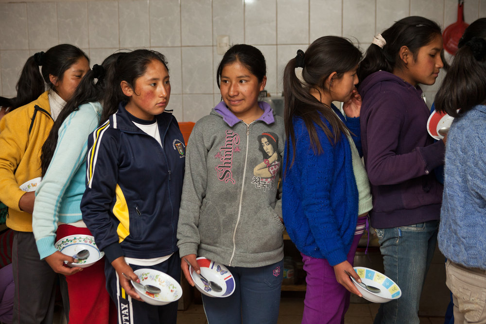  7 pm: After almost four hours of homework and lessons, the girls get ready for dinner. Here, Eli lines up with her classmates for the first course of the night: soup!  