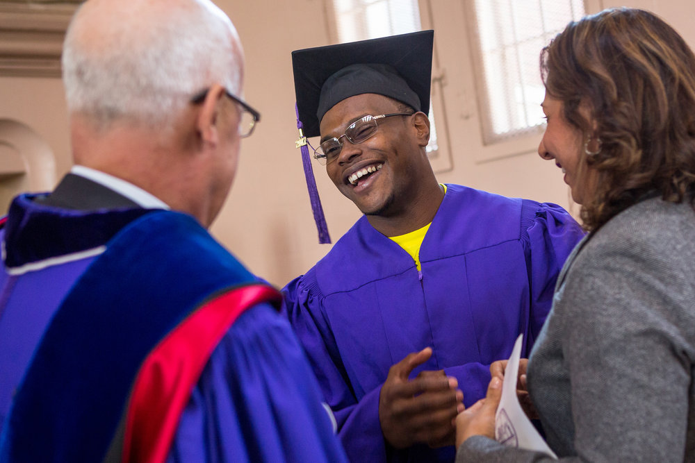  Graduate Roy Burvick chats with NYU President Andrew Hamilton. This is the first graduation for NYU's Prison Education Program. 