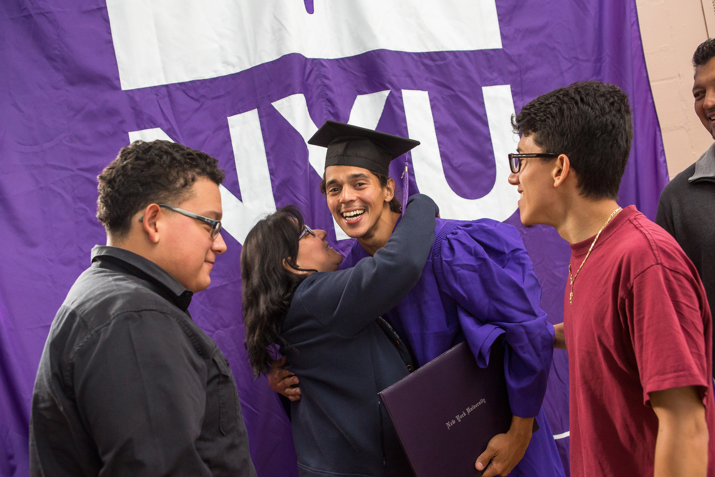  Danis Flores is embraced by family after the ceremony.&nbsp;“I’ve been given a second chance,” Danis said. “I want to make something out of myself. I need to become somebody.” 