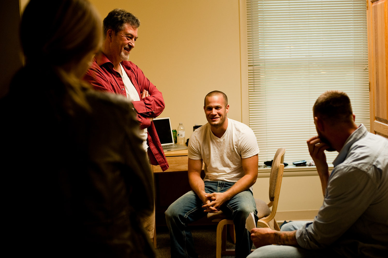 The Wardrobe Supervisor checks on the male talent in their dressing room.