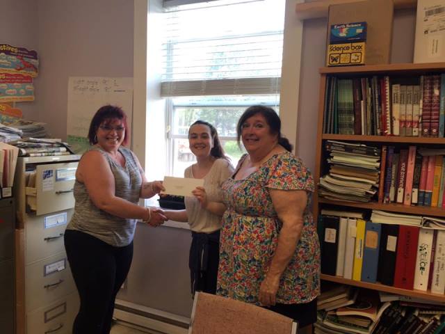 QAAW Chair Josie Lake (left) presents a Letter of Invite to The Hants Learning Centre