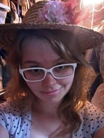 I took it upon myself to test out some costume pieces we're considering for our Drama Camp production; I can see a peasant character wearing this adorable hat!