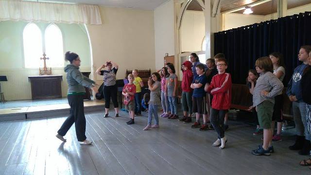 Katrina gives a lesson on all the different positions on the stage.