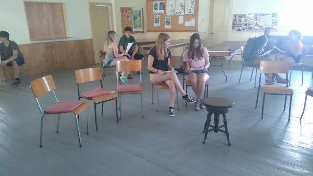 It's their first day at camp, and everyone is already hard at work! Here is a snapshot of campers working away at an exercise on character intention!